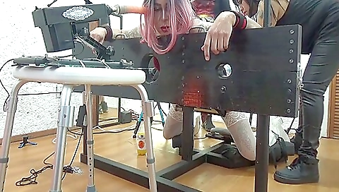 Tight pussy of the slut is getting fucked by a big dildo