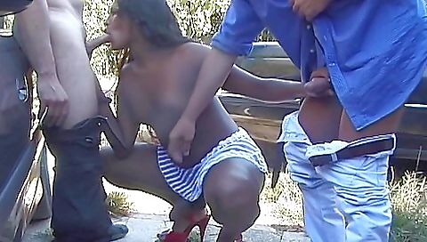 Older black woman is playing with two older black girls